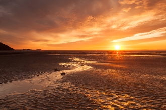 Image of a sunset over the Somerset coastline