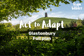 Act to Adapt banner GLASTONBURY