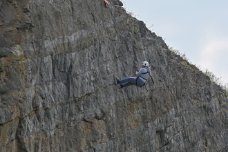 abseiling off a cliff