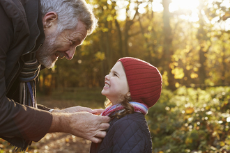 Image of a grandfather with his granddaughter