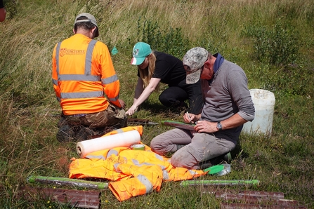 Colleagues from Somerset Wildlife Trust and ARCA labelling samples collected at Westhay Moor.