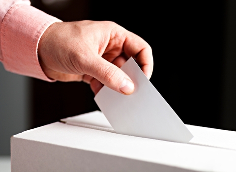Man casting his vote in an election