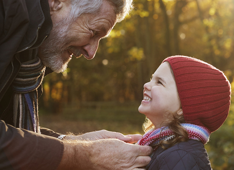 Image of a grandfather with his granddaughter